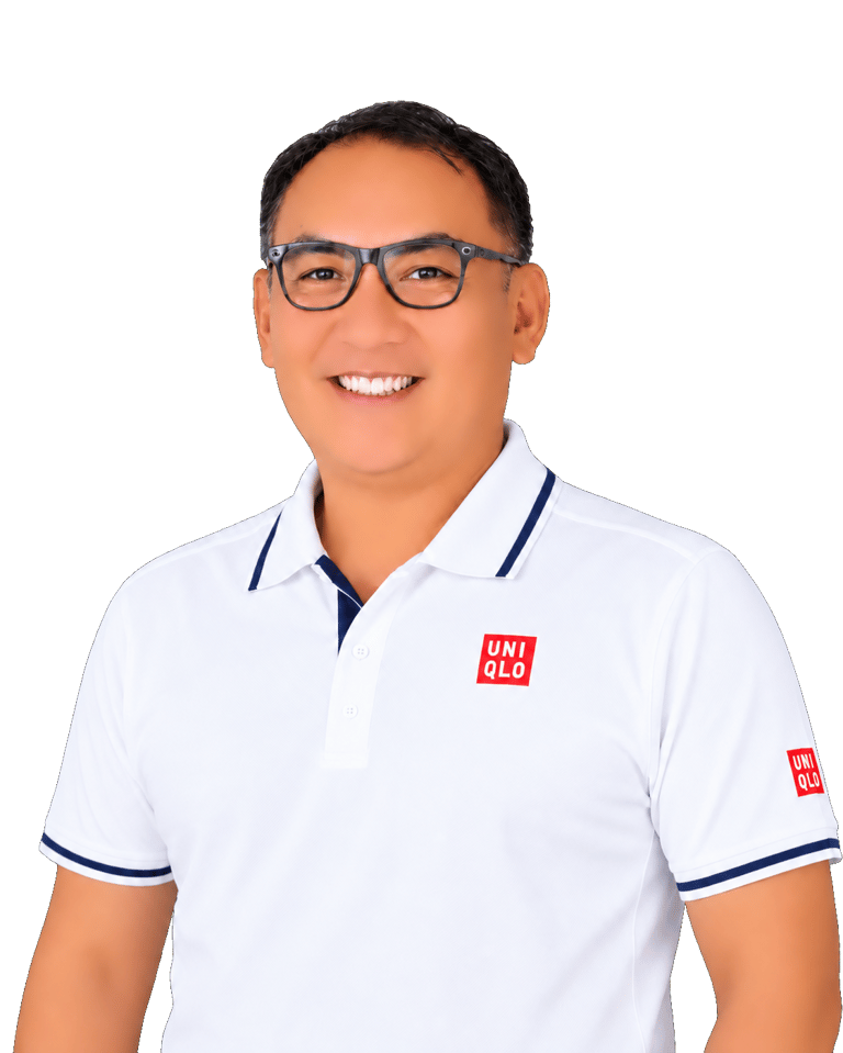 Coach Jep smiling in a white tennis polo